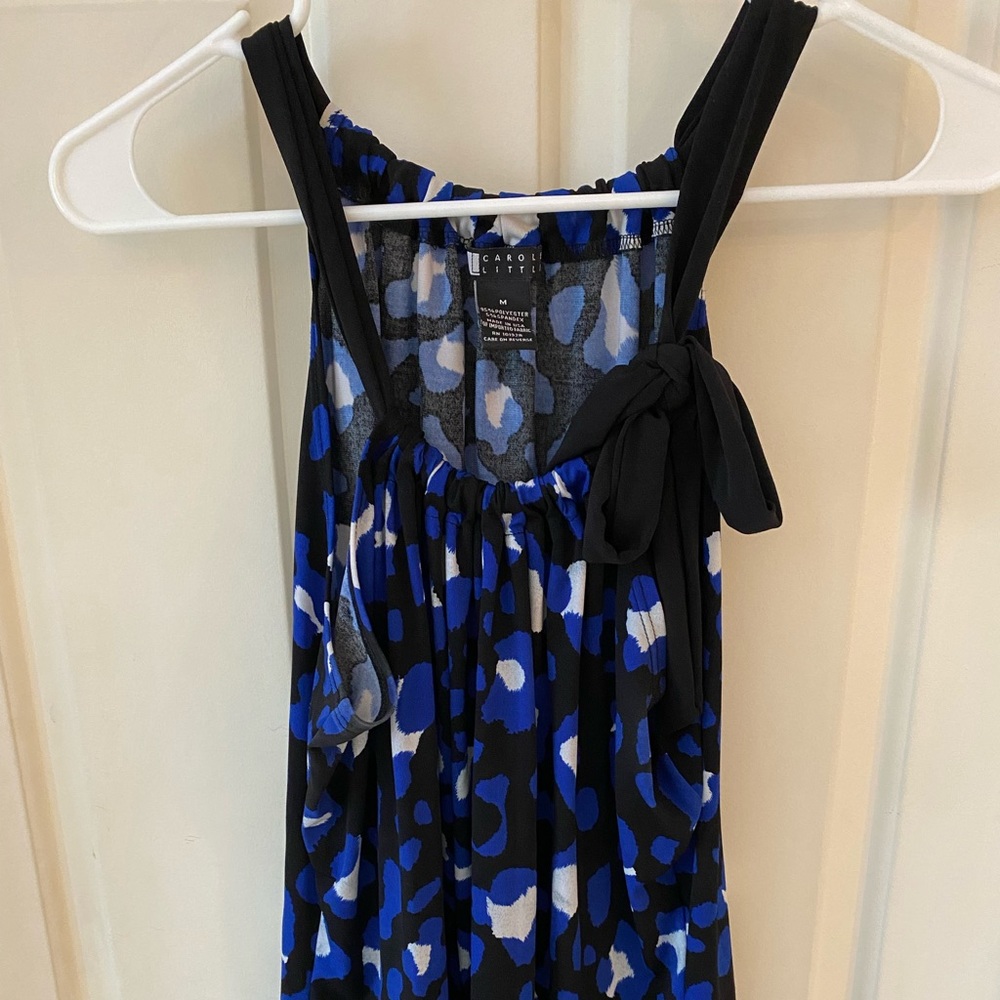 Tied strap tank